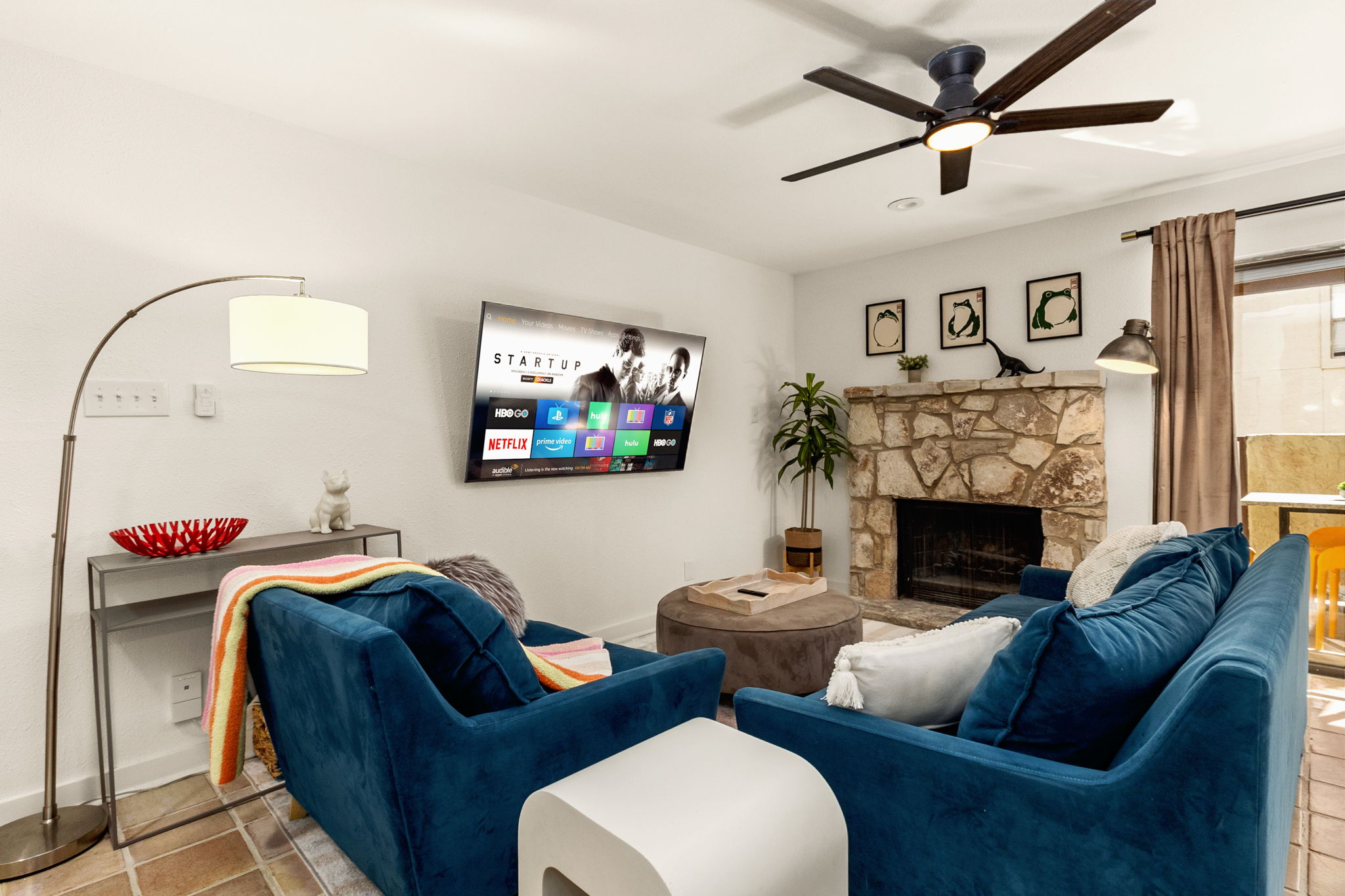 Main living space with comfortable sectional seating and entertainment center