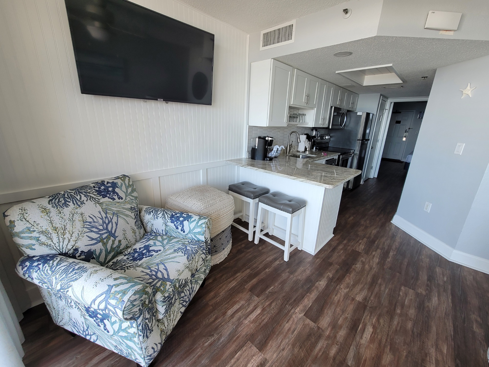 Clean kitchenette w/ essentials for your stay.