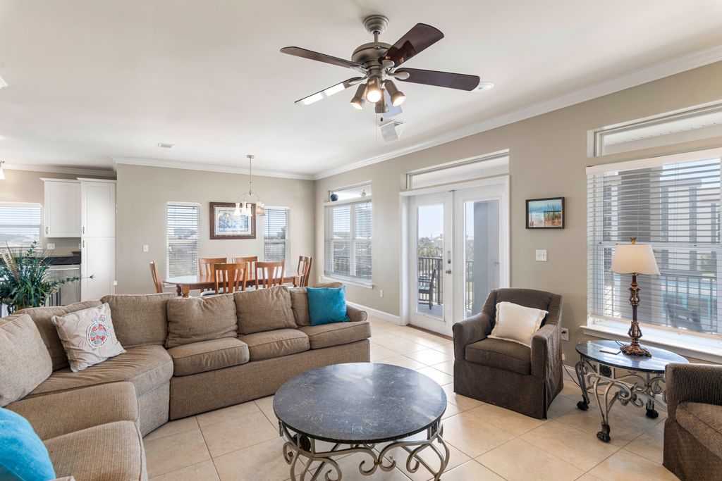 Third Floor: Living Room – Open-concept living room, bright and comfortable with plenty of seating.