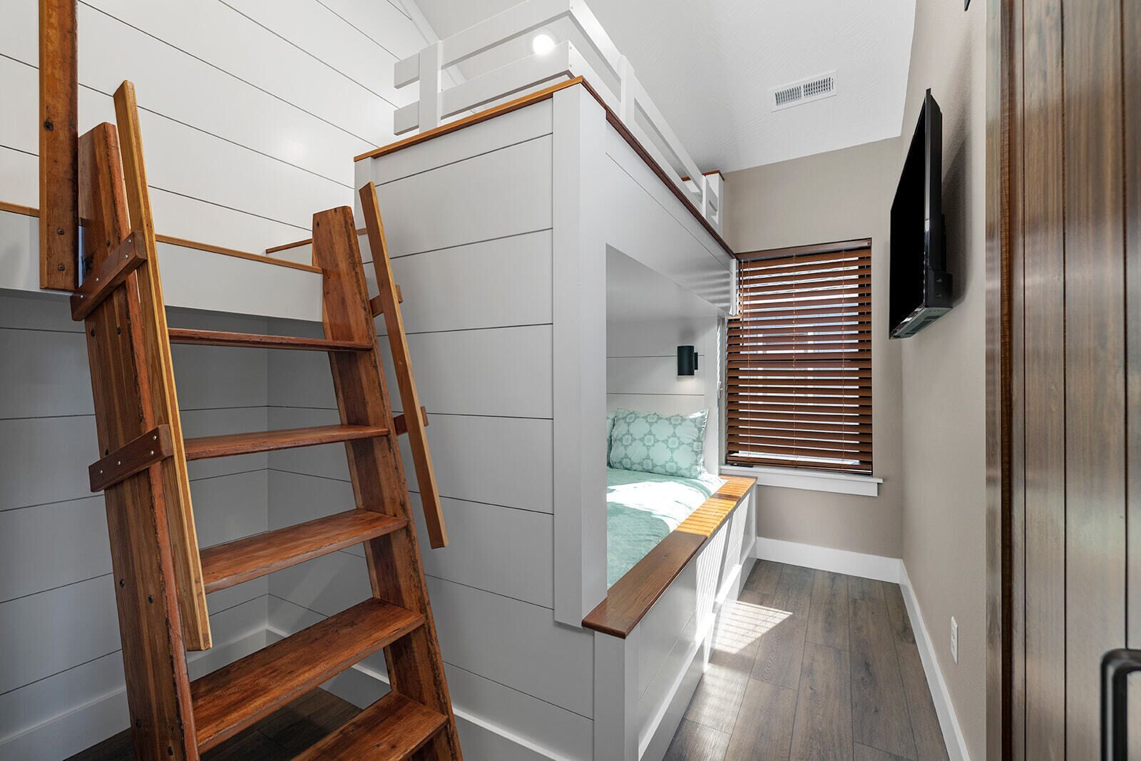 Full Over Queen Bunkroom with bathroom right outside the door