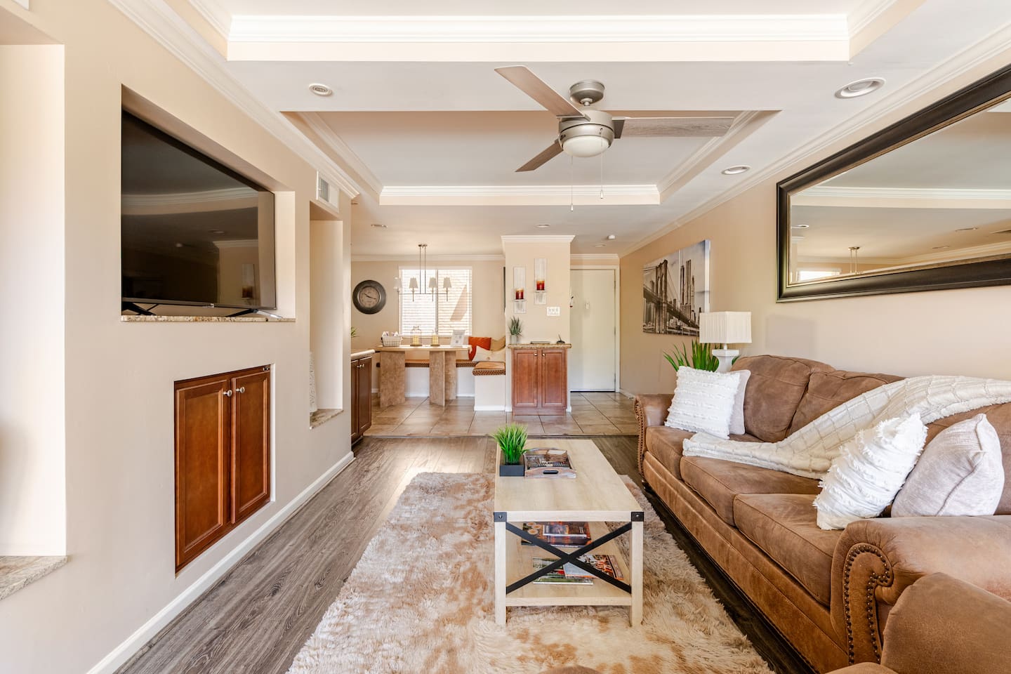 A myriad of entertainment options including a 55" 4k Roku TV, Cox Contour Cable, a Blu-Ray player, and an Amazon Echo Dot with Alexa services. Open the balcony doors for true indoor/outdoor living.