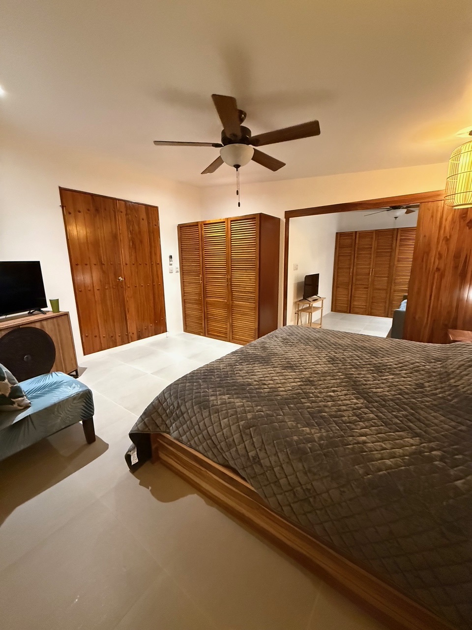 Bedroom 3 showing the barn doors open to the kid room/sitting room
