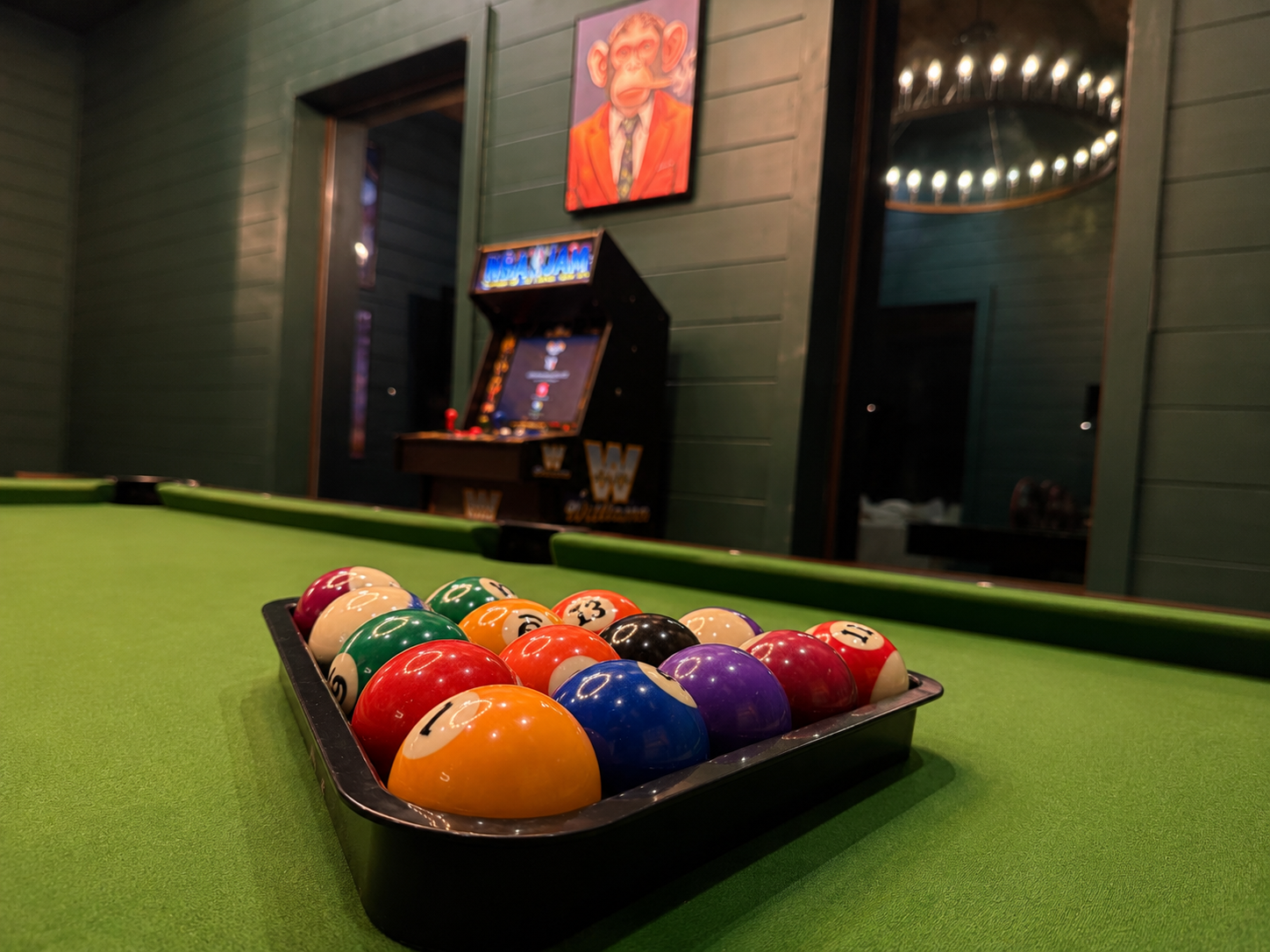 Game Room: Enjoy friendly competition with pool, arcade fun, and vibrant decor for unforgettable nights!
