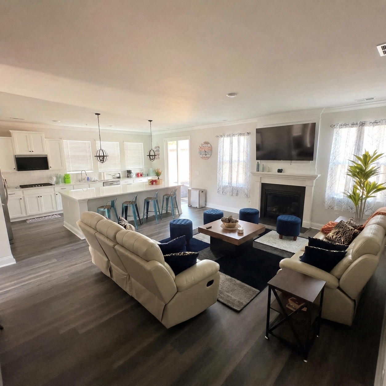 Living Room: Bright and airy space with comfy seating, perfect for laughter and memories!