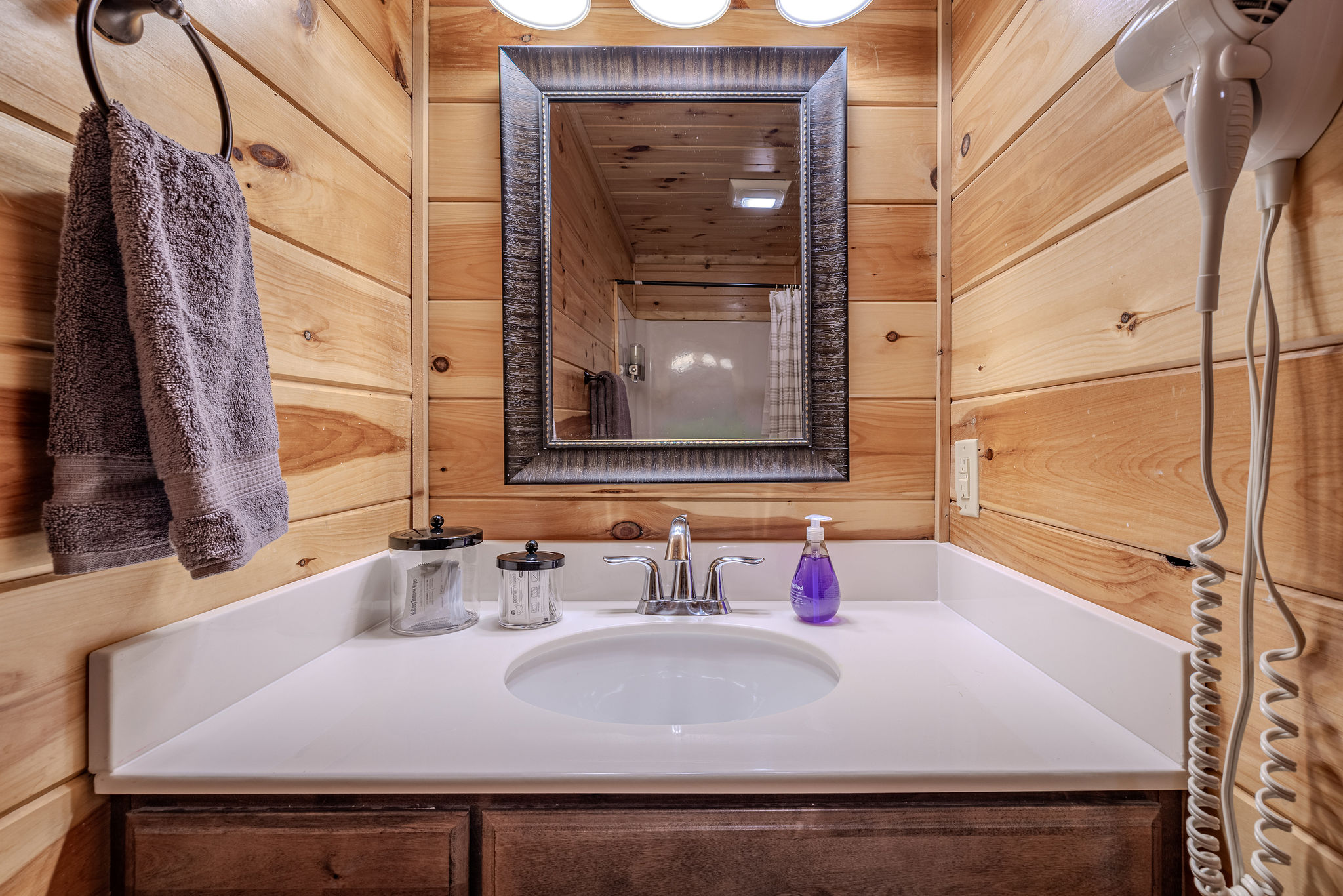 The Rhythm Suite Ensuite Bathroom serves the lower-level king suite, creating a private retreat close to The Soundstage Cinema and Afterparty Deck.