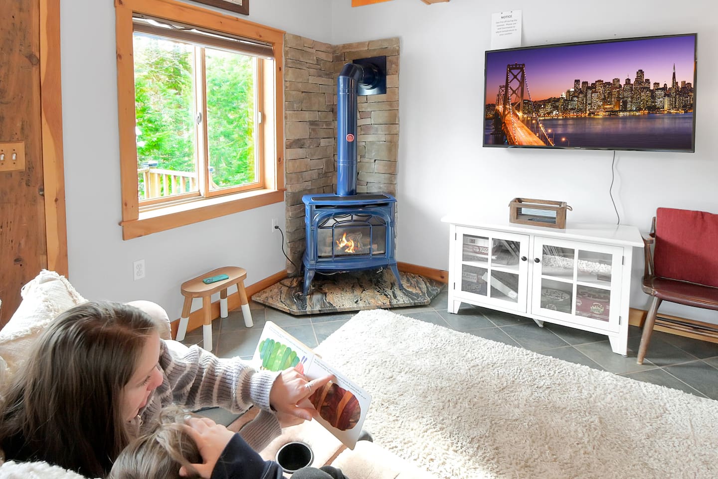 Kick back after a long night in these cozy recliners while soaking up the heat from the gas stove! 