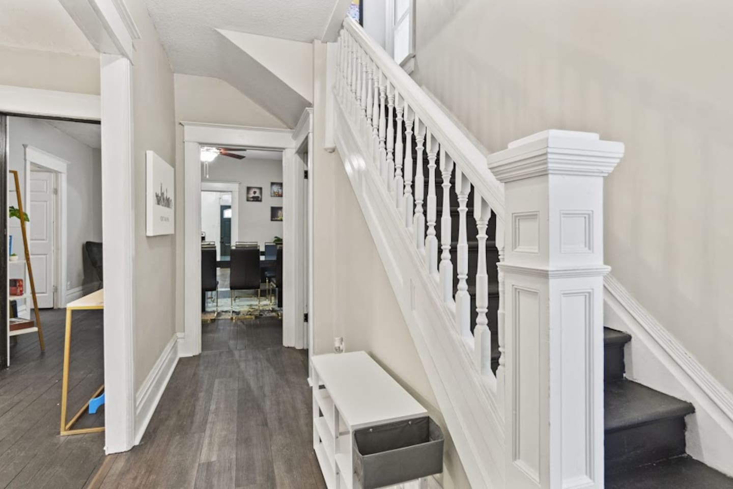 Stylish hallway with stairs leading to the 2nd floor, featuring cozy design elements, sleek flooring, and a warm, inviting ambiance—perfectly blending functionality with modern elegance