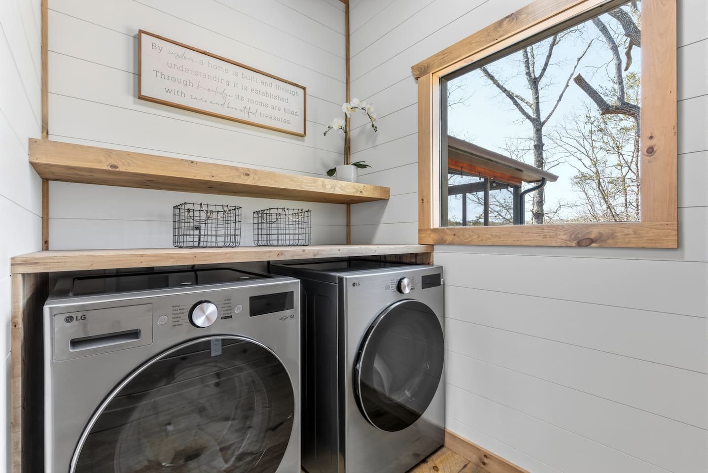 These x-large capacity washer/dryer and folding table make laundry a breeze. There is a large hanging rack on the opposite wall for delicates.