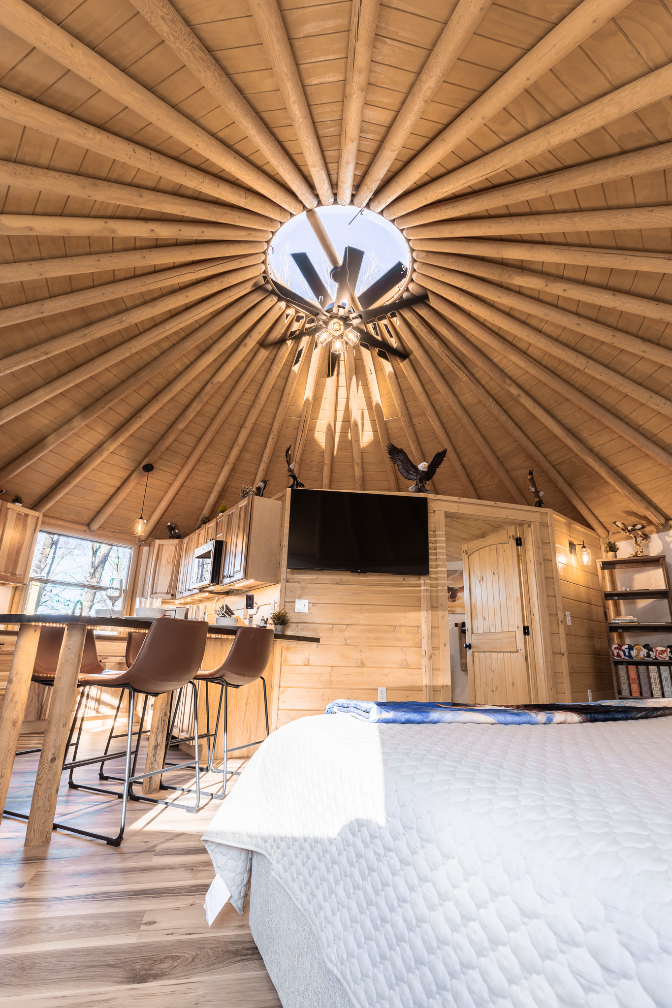 Soaring dome ceiling with skylight and open-concept living below