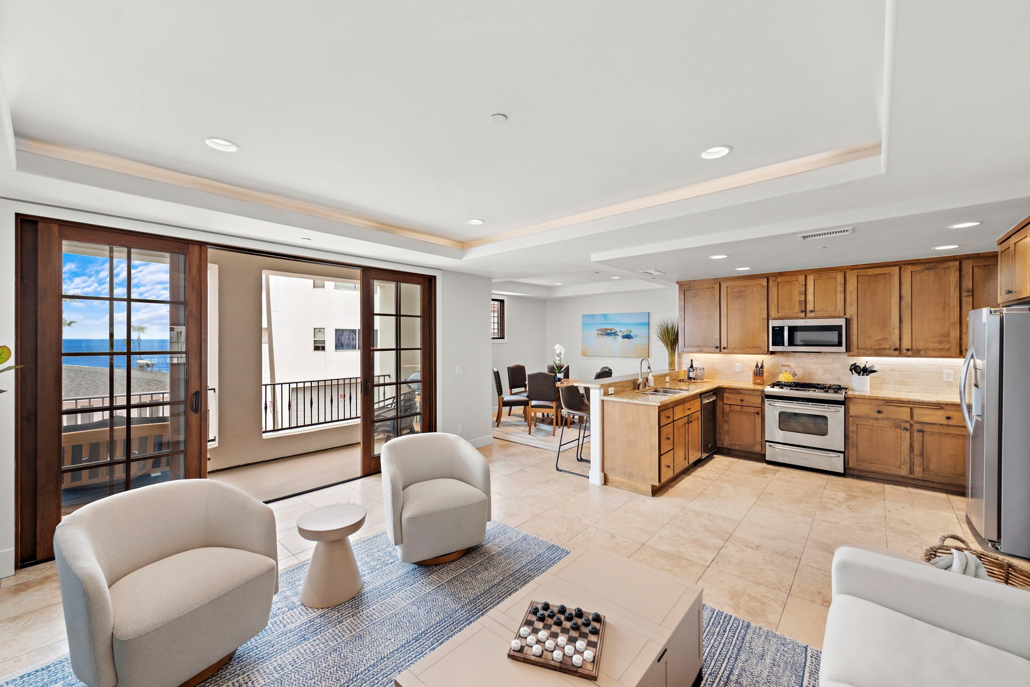 The open floorplan enables you to prepare meals for your friends and family without missing out on conversations or the view :)