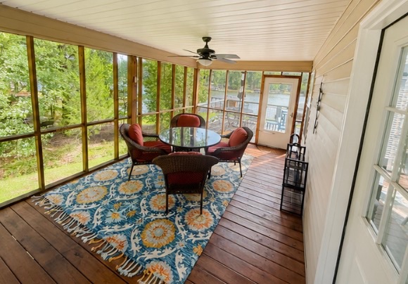 Cozy sitting area with vibrant red accent chair