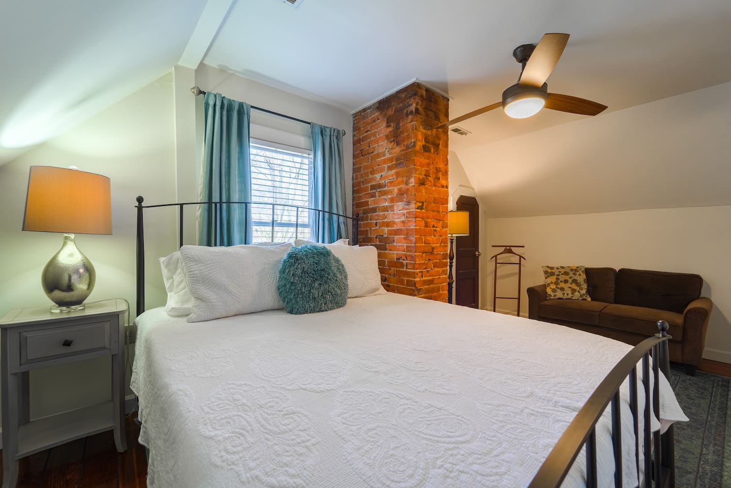 Brand new Crate and Barrel queen-size bed with luxury linens and plush pillows!