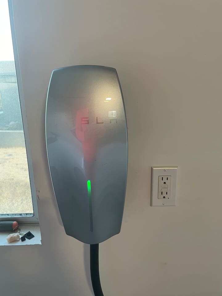 Tesla charger available in the garage.