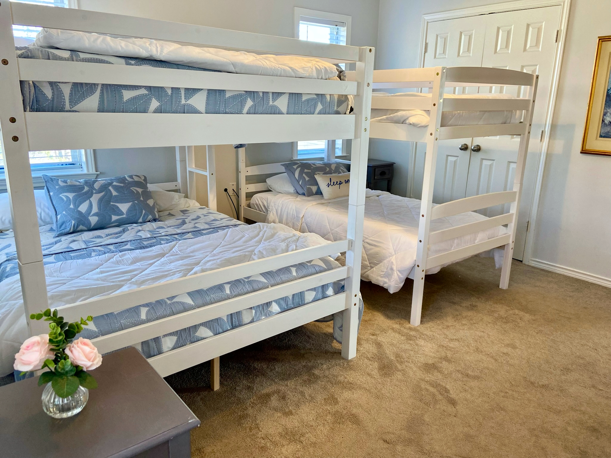 Farmhouse bedroom 4 - pass thru room with full-over-full and twin-over -twin bunkbeds and a cot