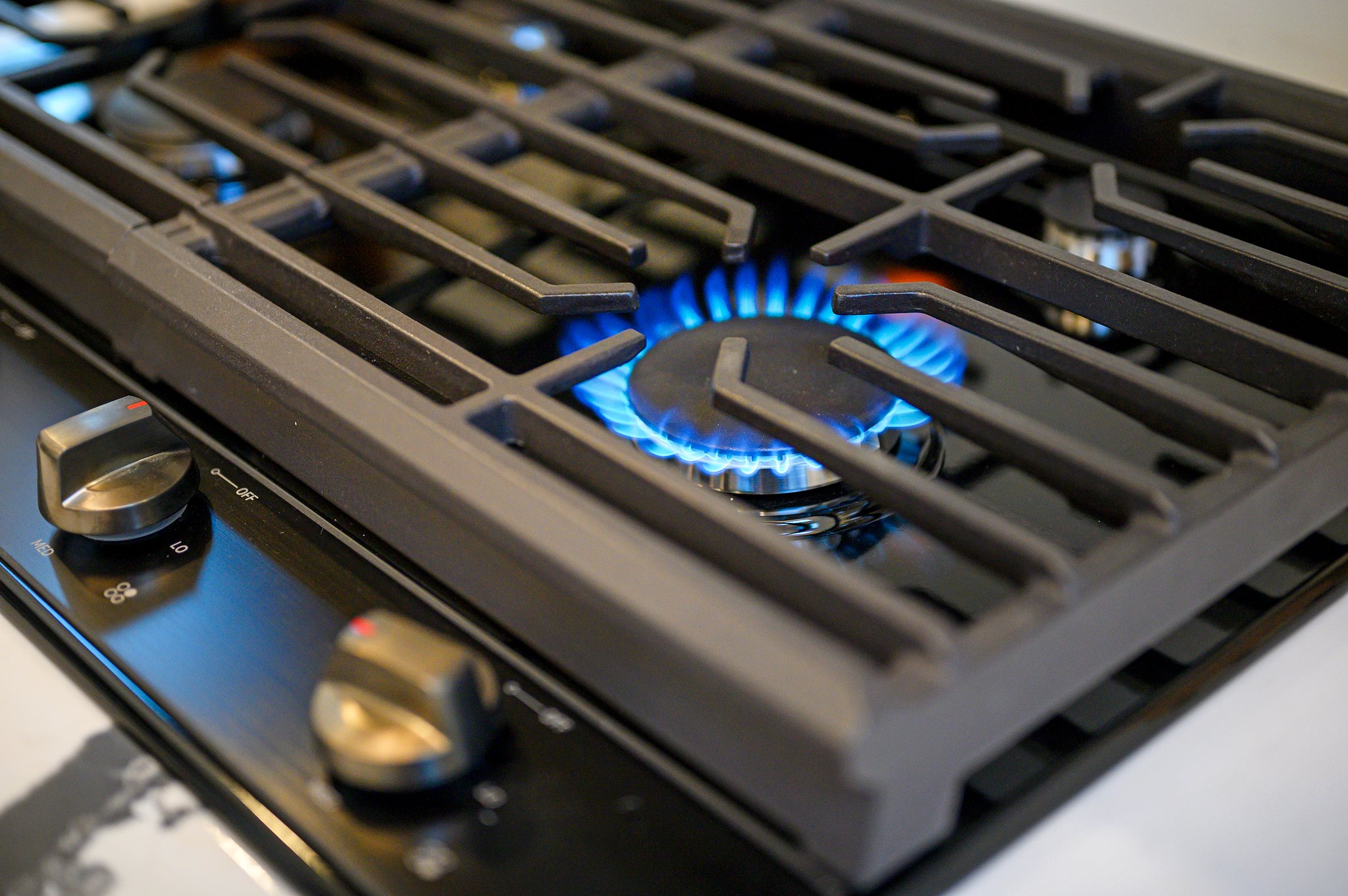 The professional-style gas range is perfect for home chefs, offering high performance in a beautifully designed space.