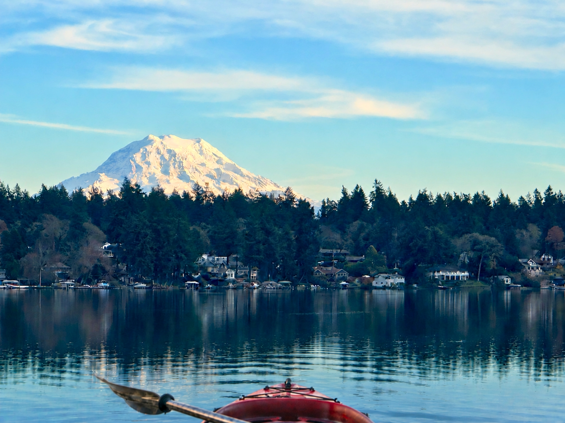 On clear days, paddle across glassy Lake Steilacoom (south end) with majestic Mount Rainier rising beyond the shoreline—complimentary kayaks and paddleboards make it easy to explore.