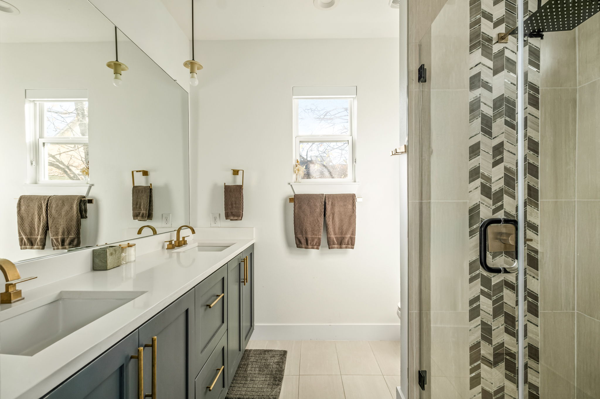 Refresh in a beautifully designed bathroom with a walk-in shower