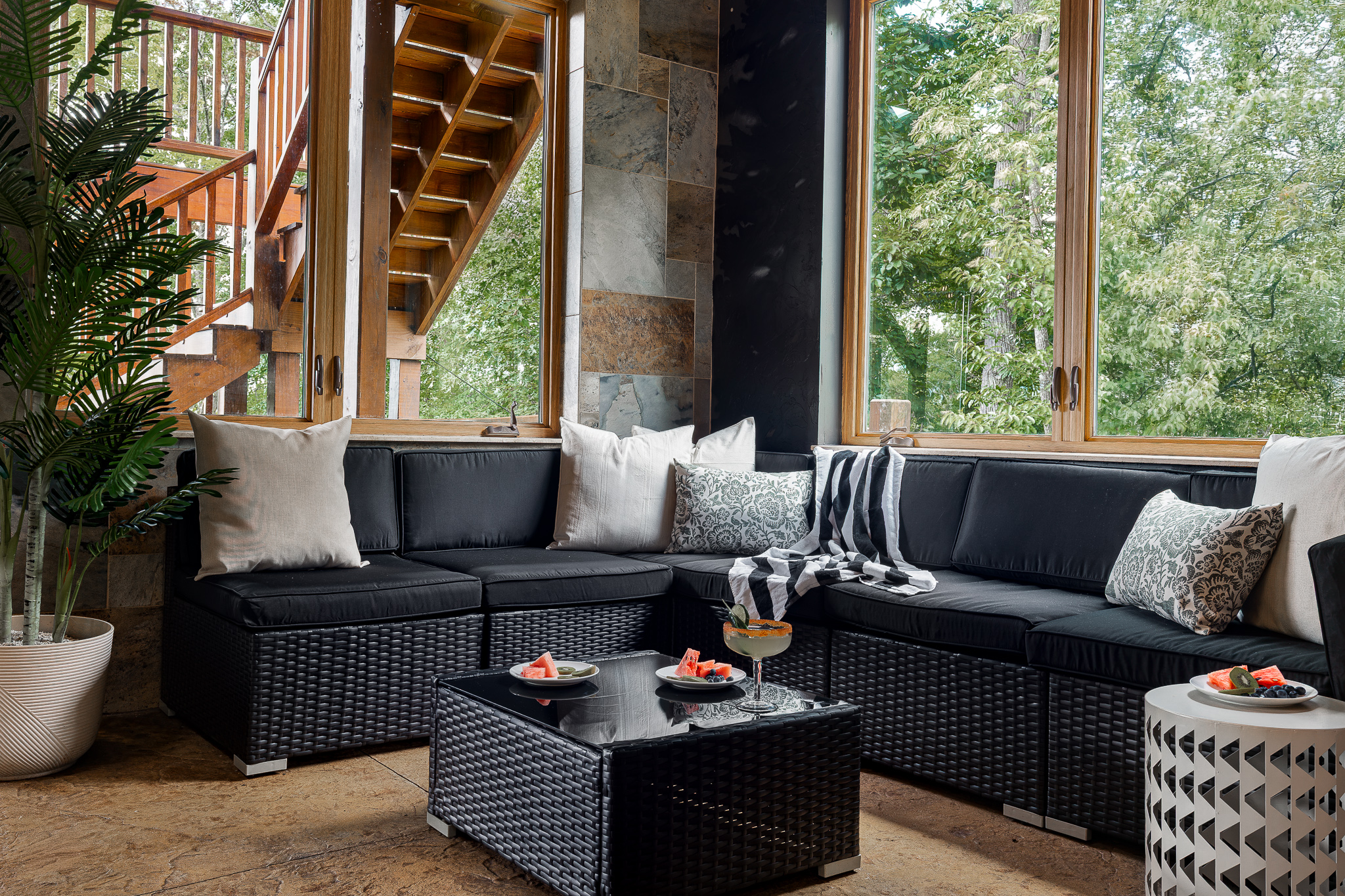 {Pool House Lounge} Relax in the comfortable sectional just steps from the indoor pool, with walls of windows bringing the surrounding forest right into the space.