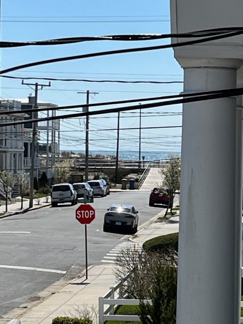 view of ramp to boardwalk/beach access from property