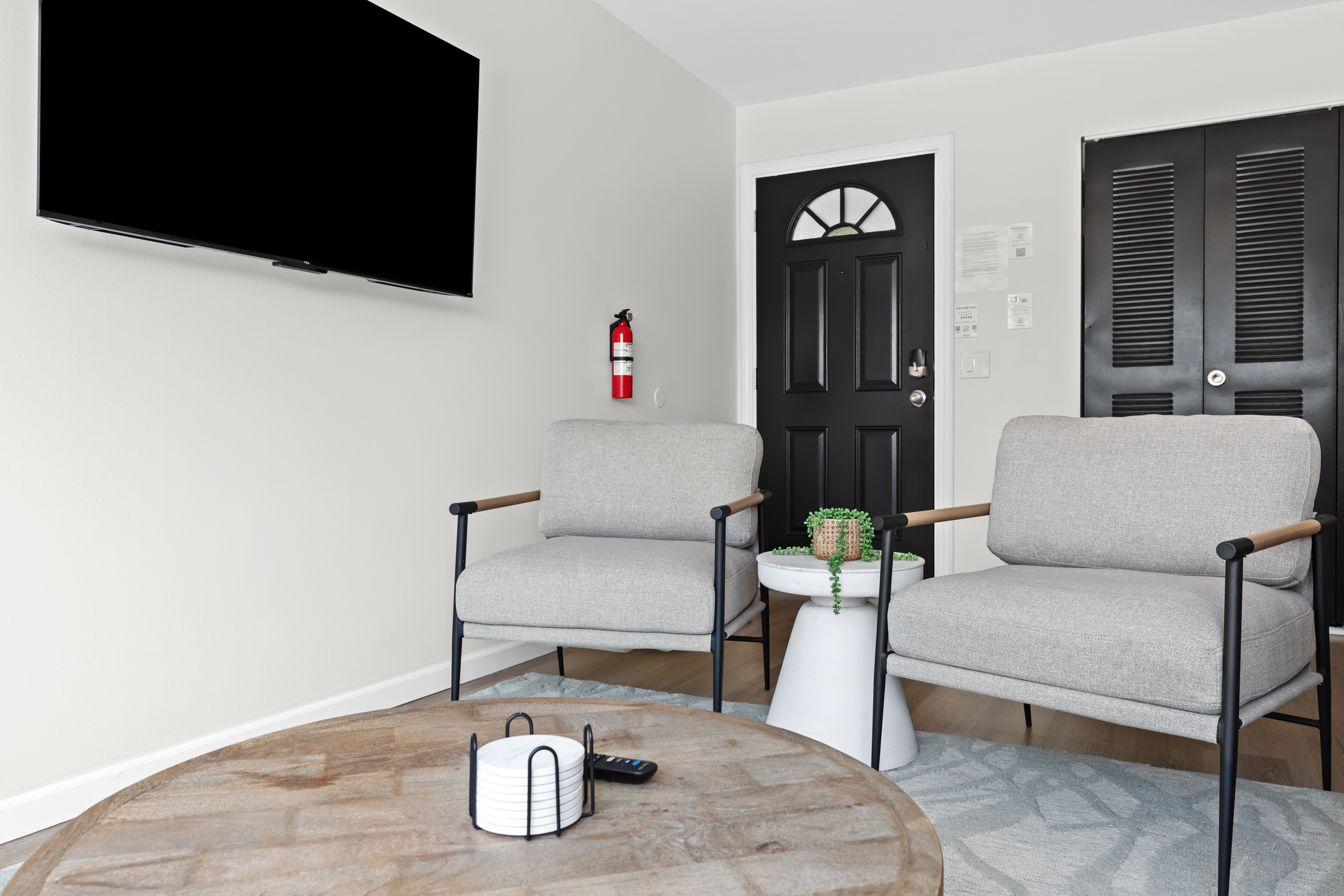 Cozy chairs and coffee table in a quiet corner of the living room.