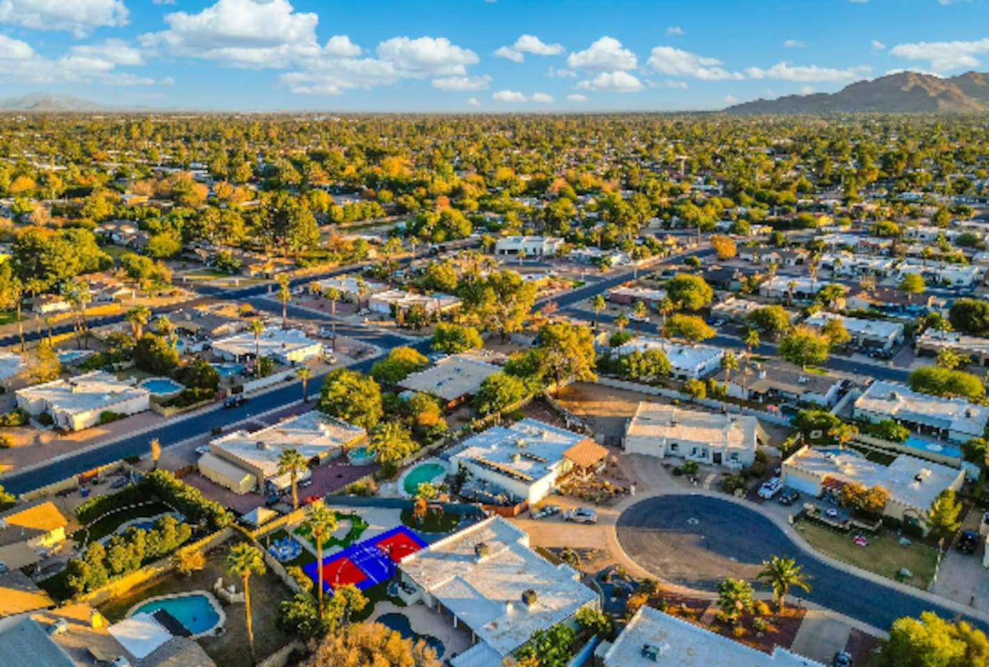 Set in a quiet, established Scottsdale neighborhood, with the property's own color-block court giving it away from the sky.