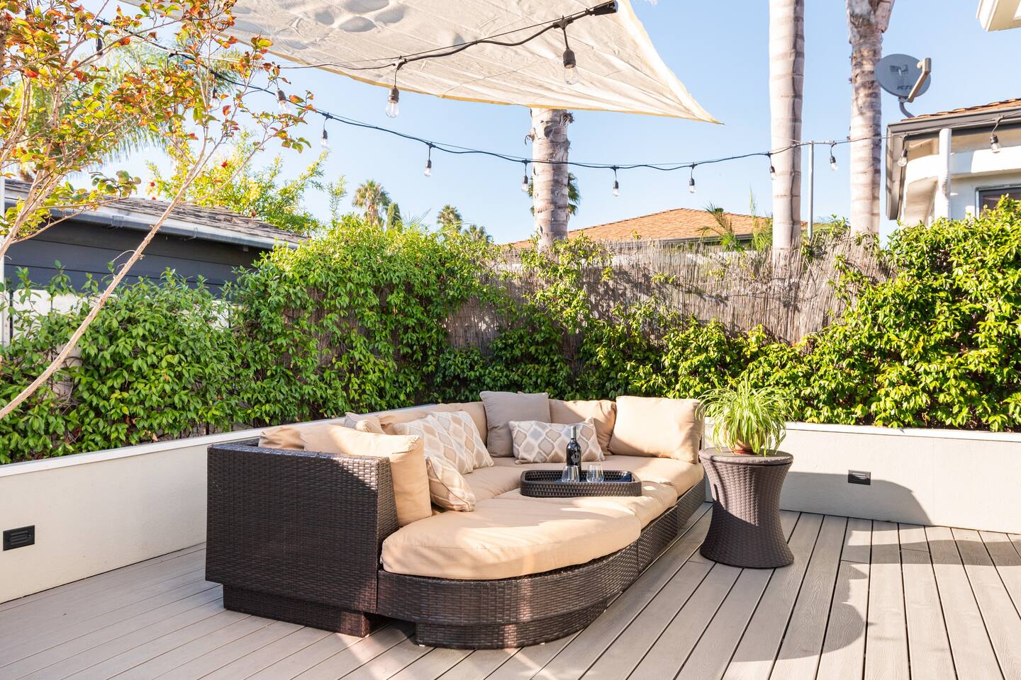 Large outdoor daybed is perfect for lounging or an afternoon nap. The cooler lifts up to add ice, should you want to spend the afternoon relaxing in the backyard. The sun sails help to provide some shade.