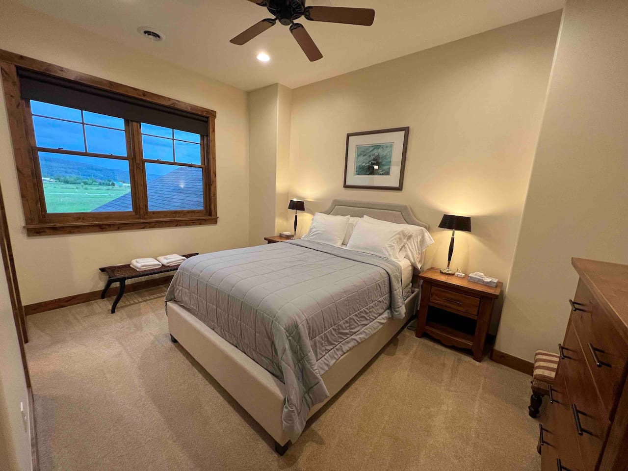 Upstairs queen bed in bedroom 3 with smart TV