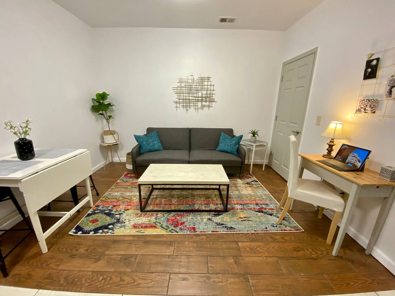 living room with pull out dining table for 4 and  working area if needed. 