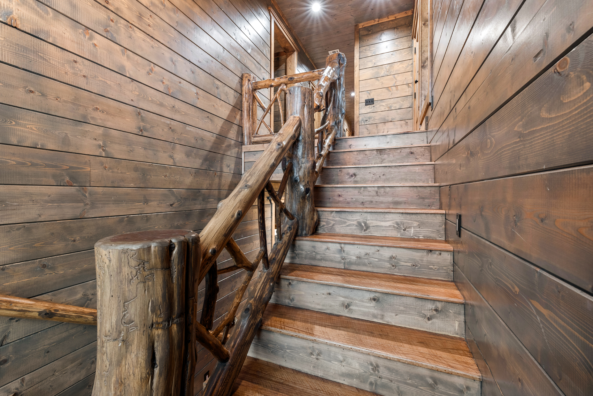 Handcrafted wooden staircase showcasing authentic cabin charm