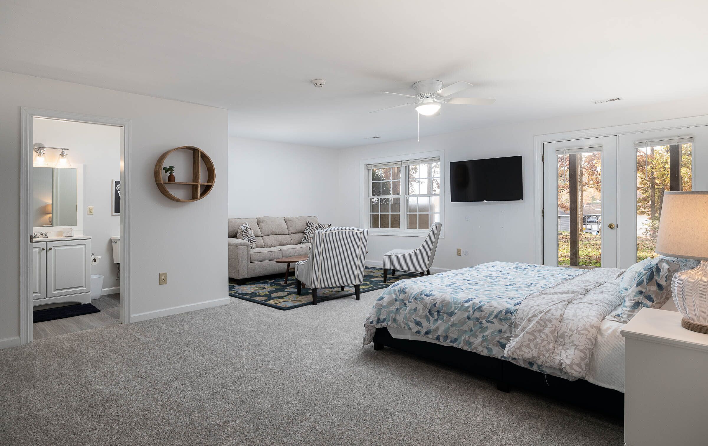 basement master with king bed, sofa bed, and private bathroom