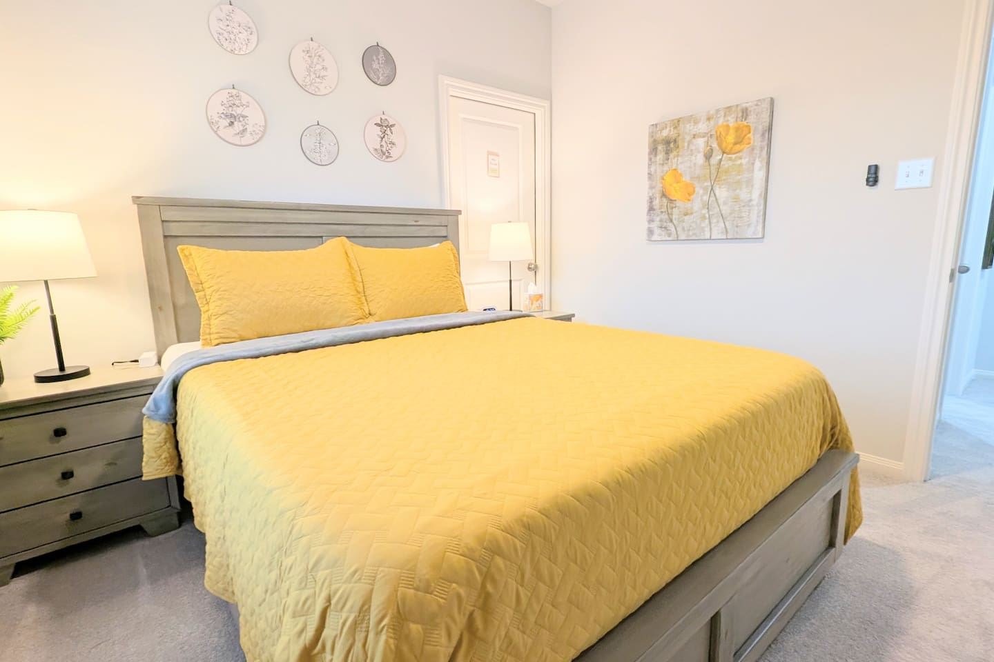 Bedside tables with easy access charging ports on both sides. 