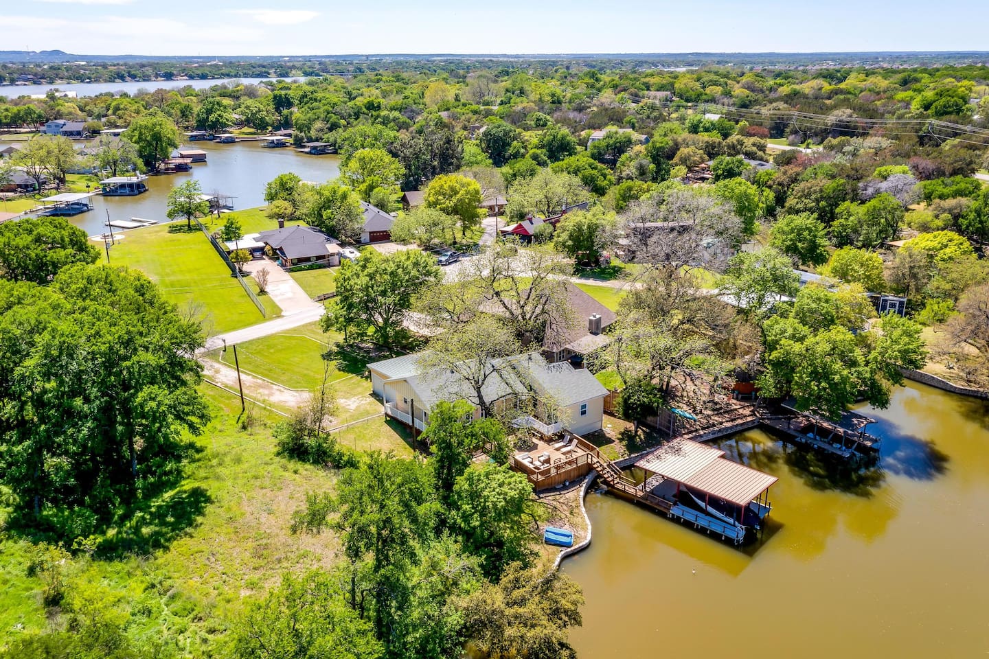 Aerial view of private canal-front location on Lake Granbury — quiet neighborhood just minutes from Historic Granbury Square.