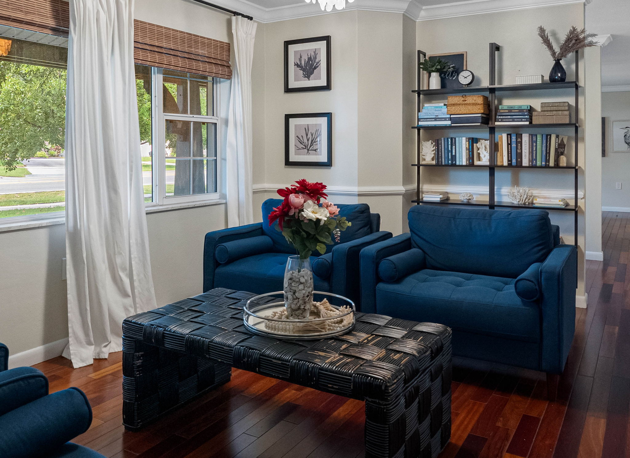 With its comfortable seating arrangement and tasteful décor, this family room is perfect for casual conversations or game nights.