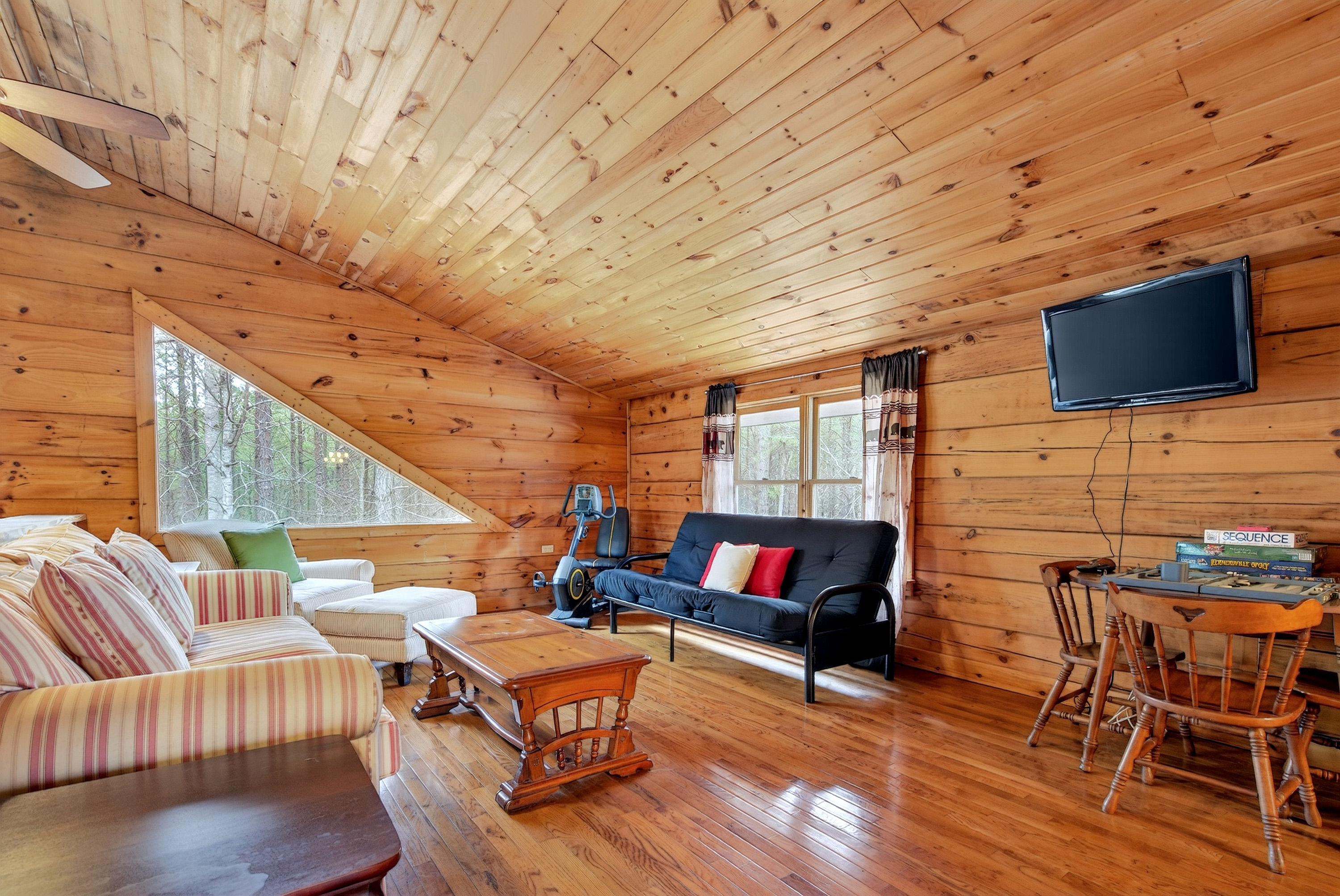 There is an exercise bike in the loft along with board games and a TV with Roku