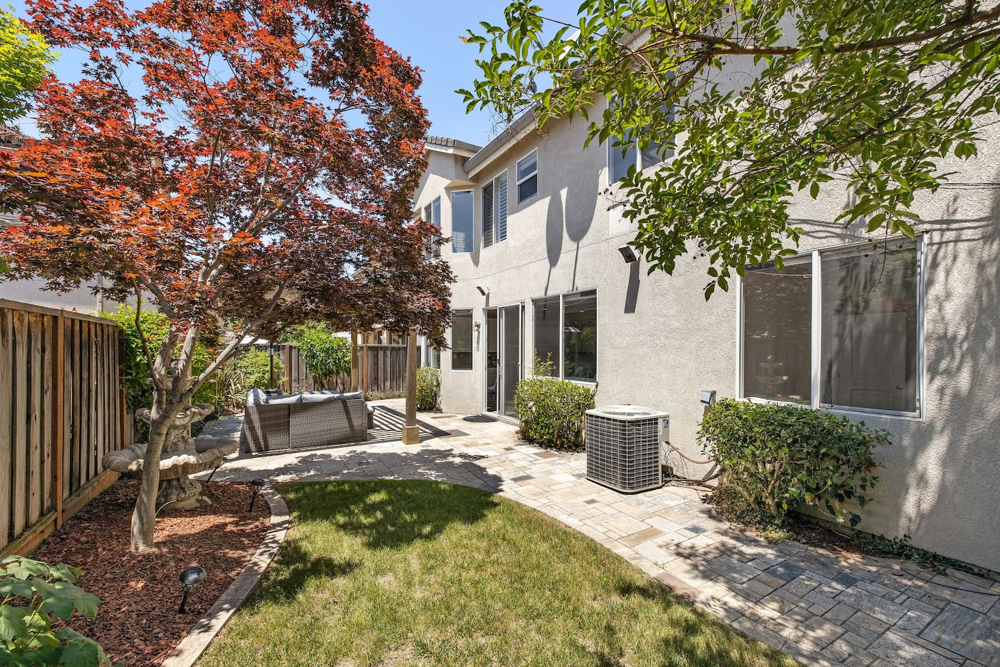 Enjoy the day or night in our spacious backyard