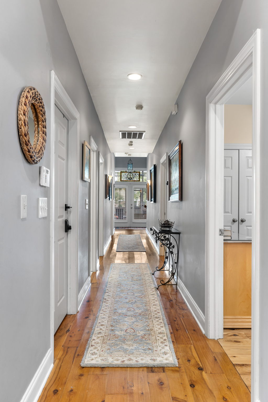 Interior. Bedrooms off hallway.