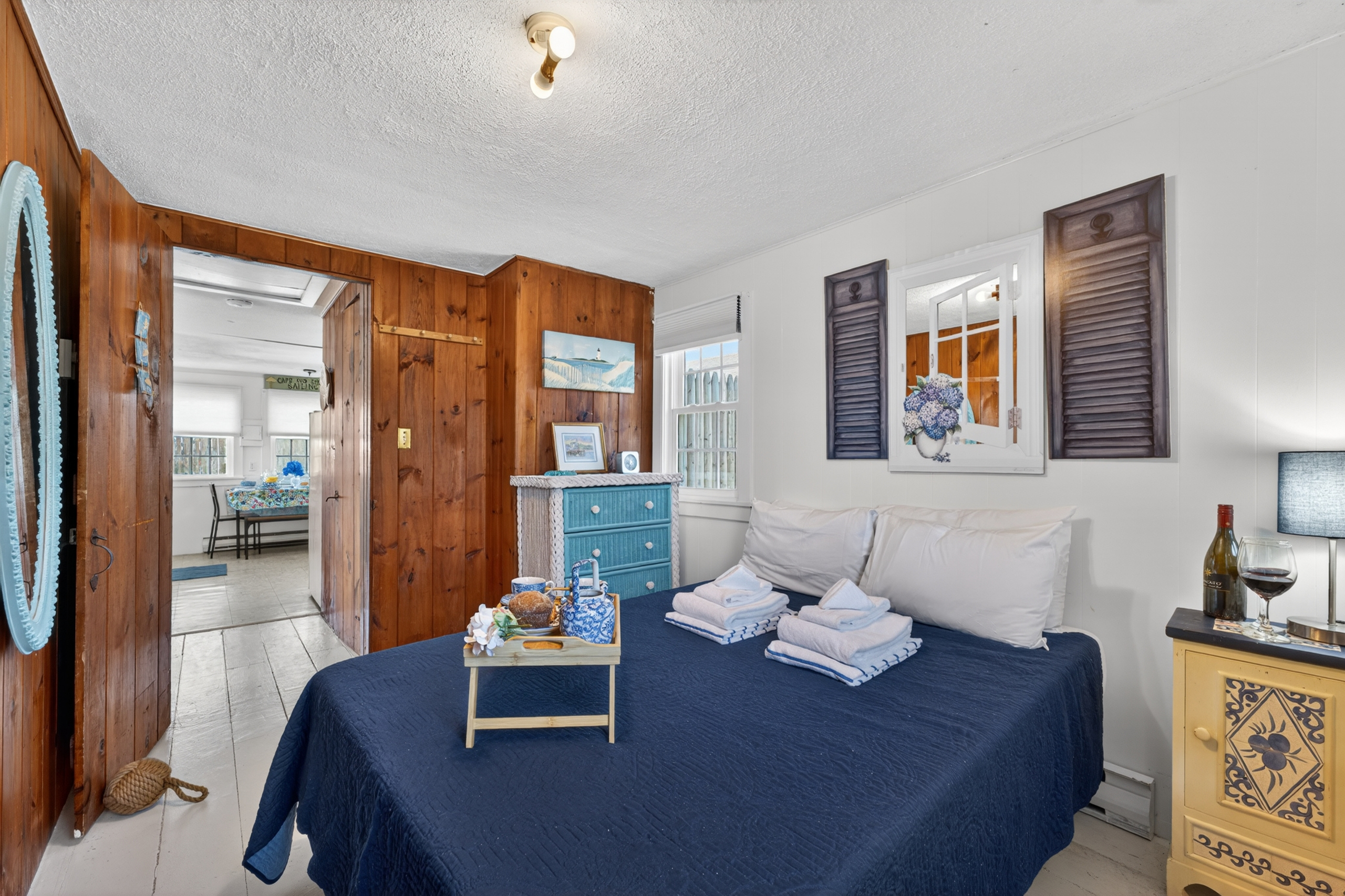 Welcome to our first bedroom! A peaceful master bedroom with a comfortable full-size bed for restful nights!