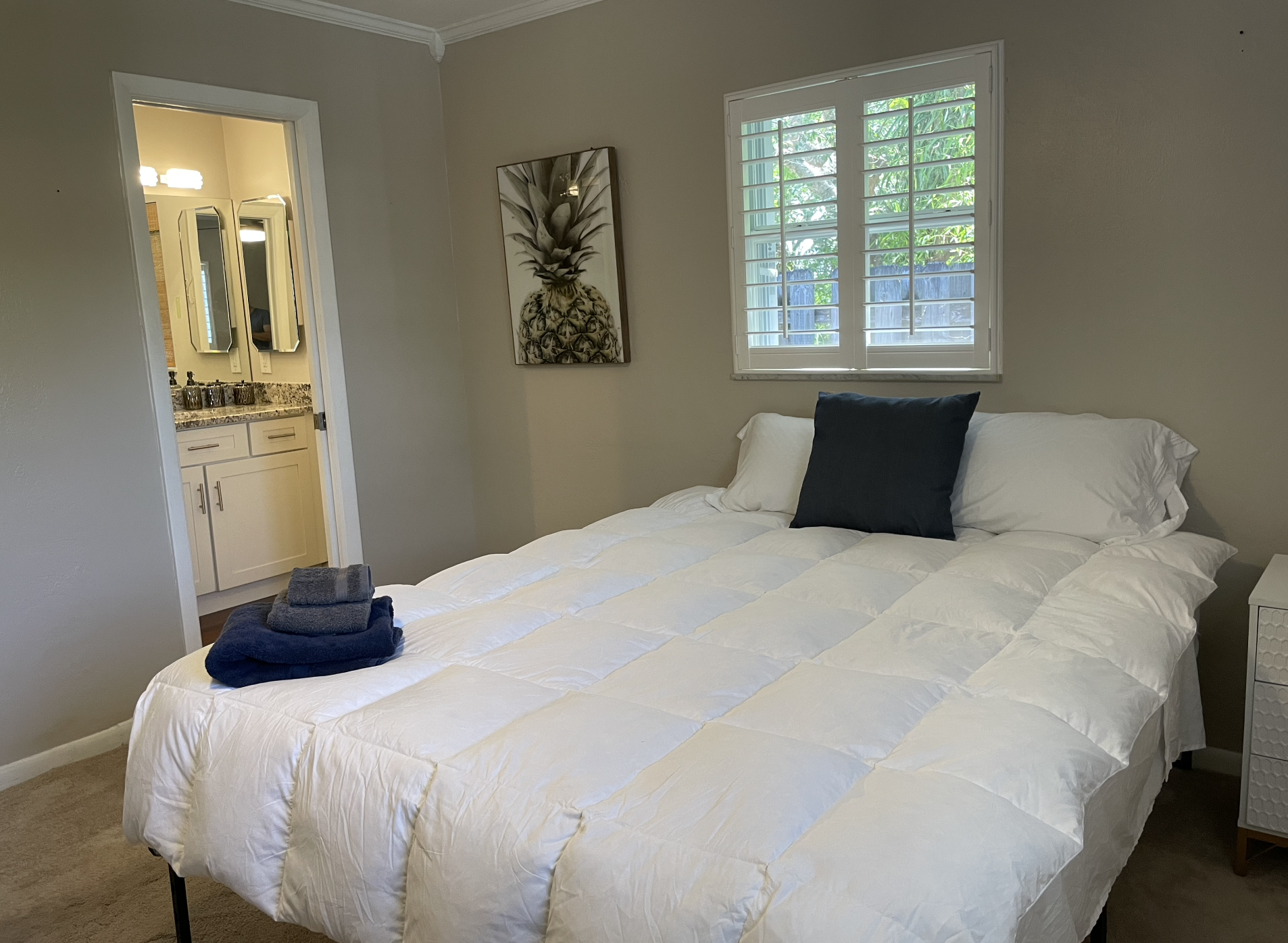 Our main bedroom has plenty of space and a comfortable bed, with an ensuite bathroom also.