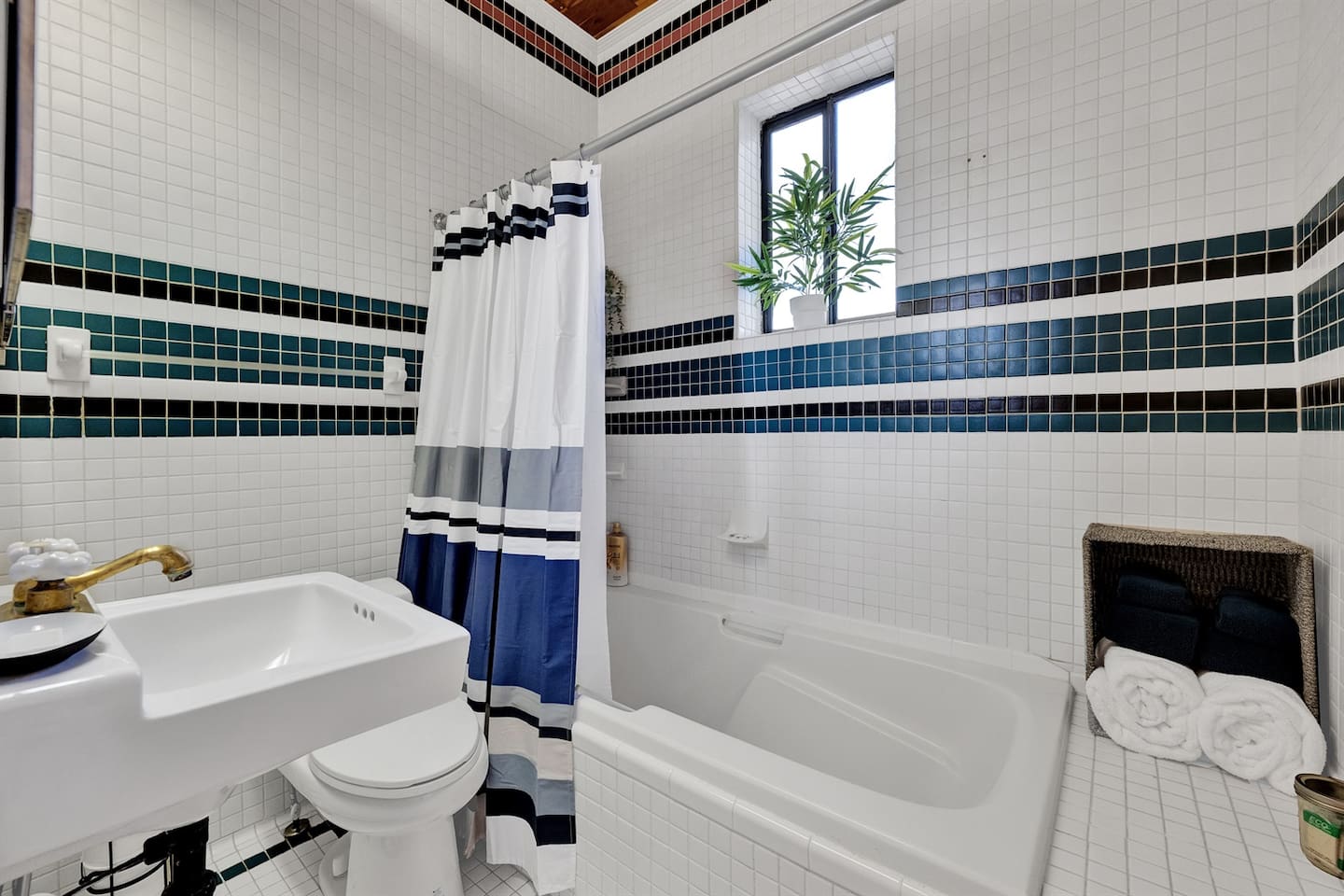 Take a moment to admire the tilework and original ceiling details — vintage charm like this can’t be replicated.