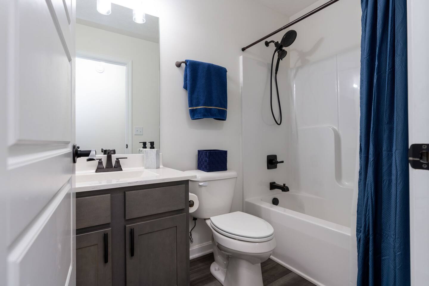 main bathroom featuring updated showerheads