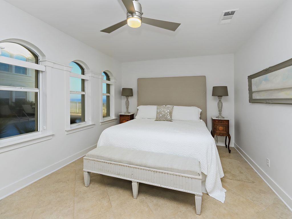 Comfortable master bedroom with a peek at the Gulf