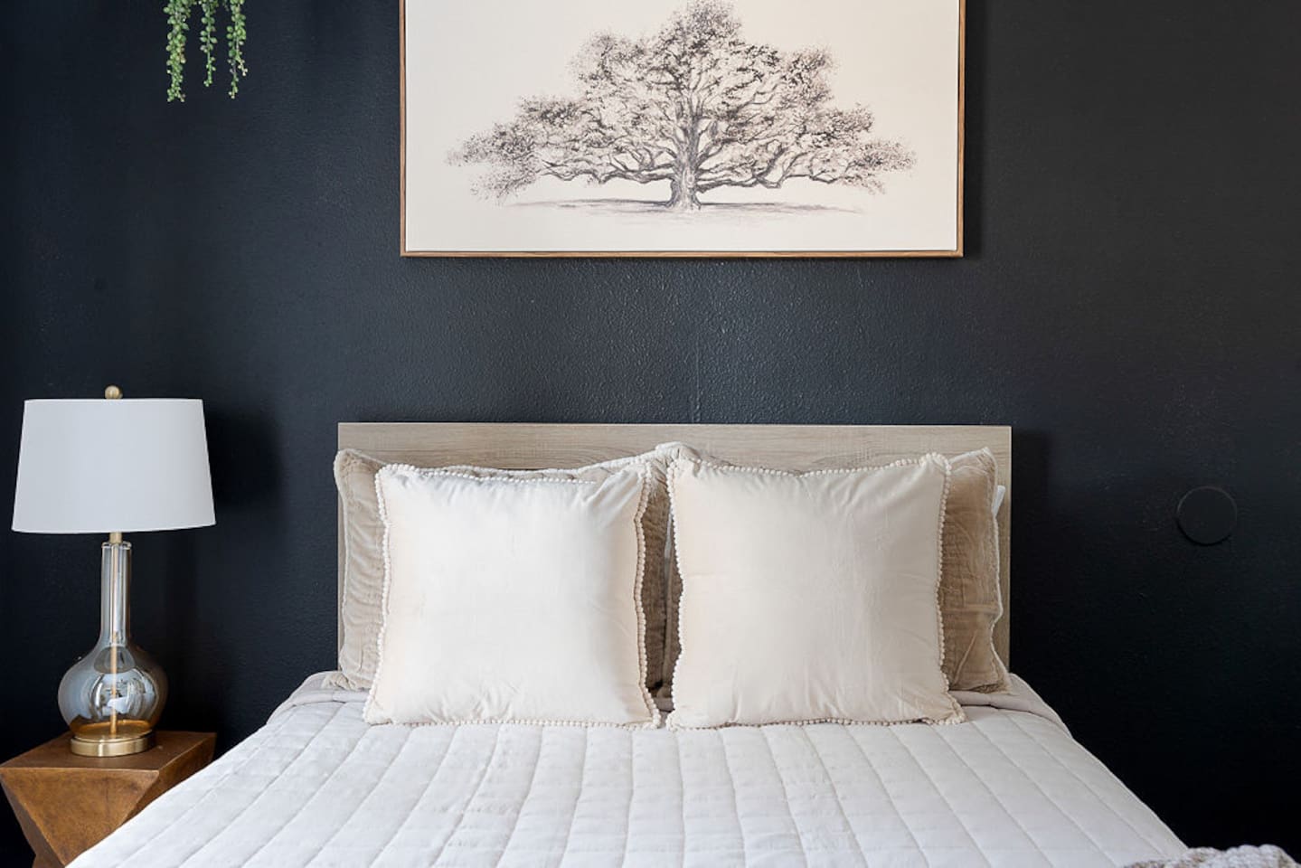 Enjoy this comfortable double bed, nightstand, lamp and closet with extra storage for your ultimate relaxation during your stay