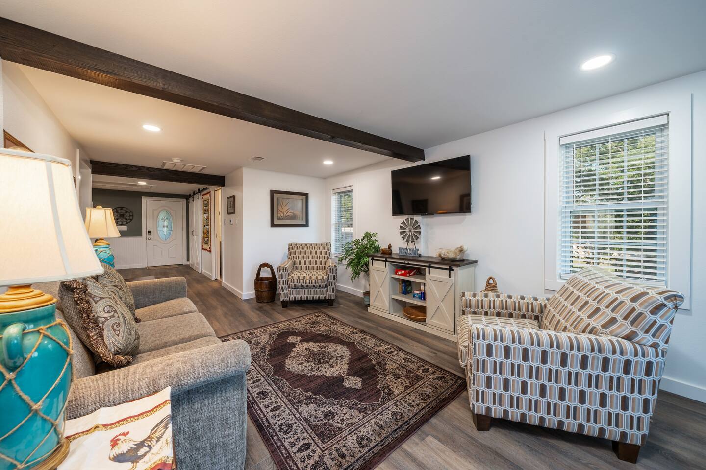 Living room with all the comforts of home.  Looking towards the kitchen.