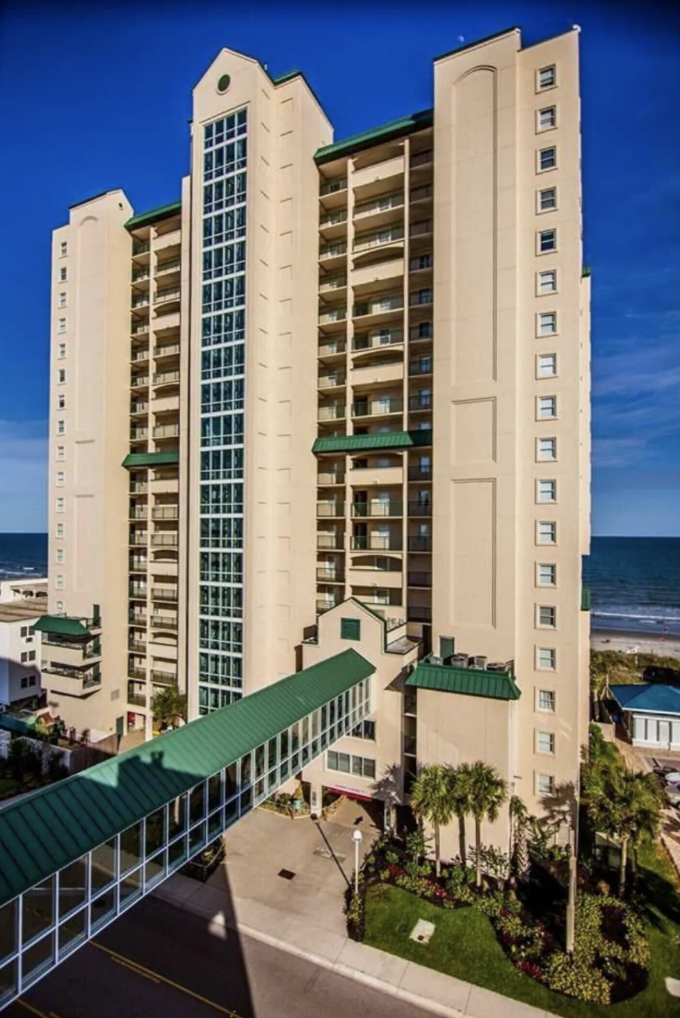 A view of the Windy Hill Dunes Building from the parking garage with the skypath giving you easy access to get from your car to the condo.