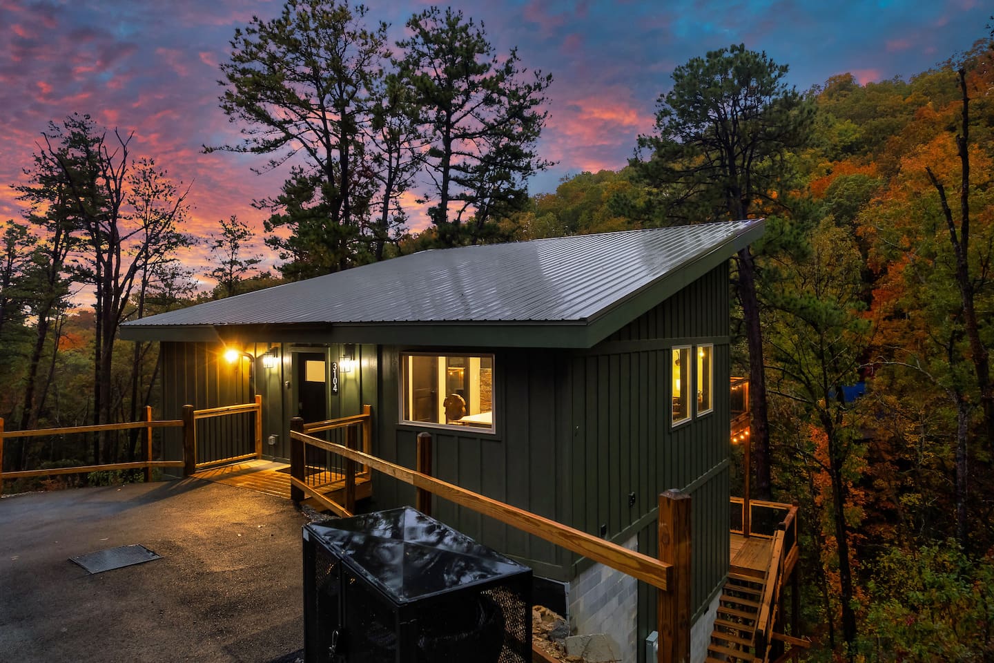 Modern Smoky Mountain cabin with breathtaking sunset views.