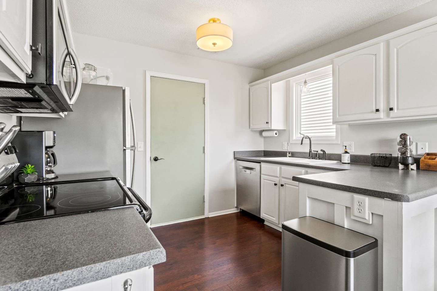 From the dishwasher to the trash bin, this kitchen is thoughtfully arranged for convenience and efficiency.