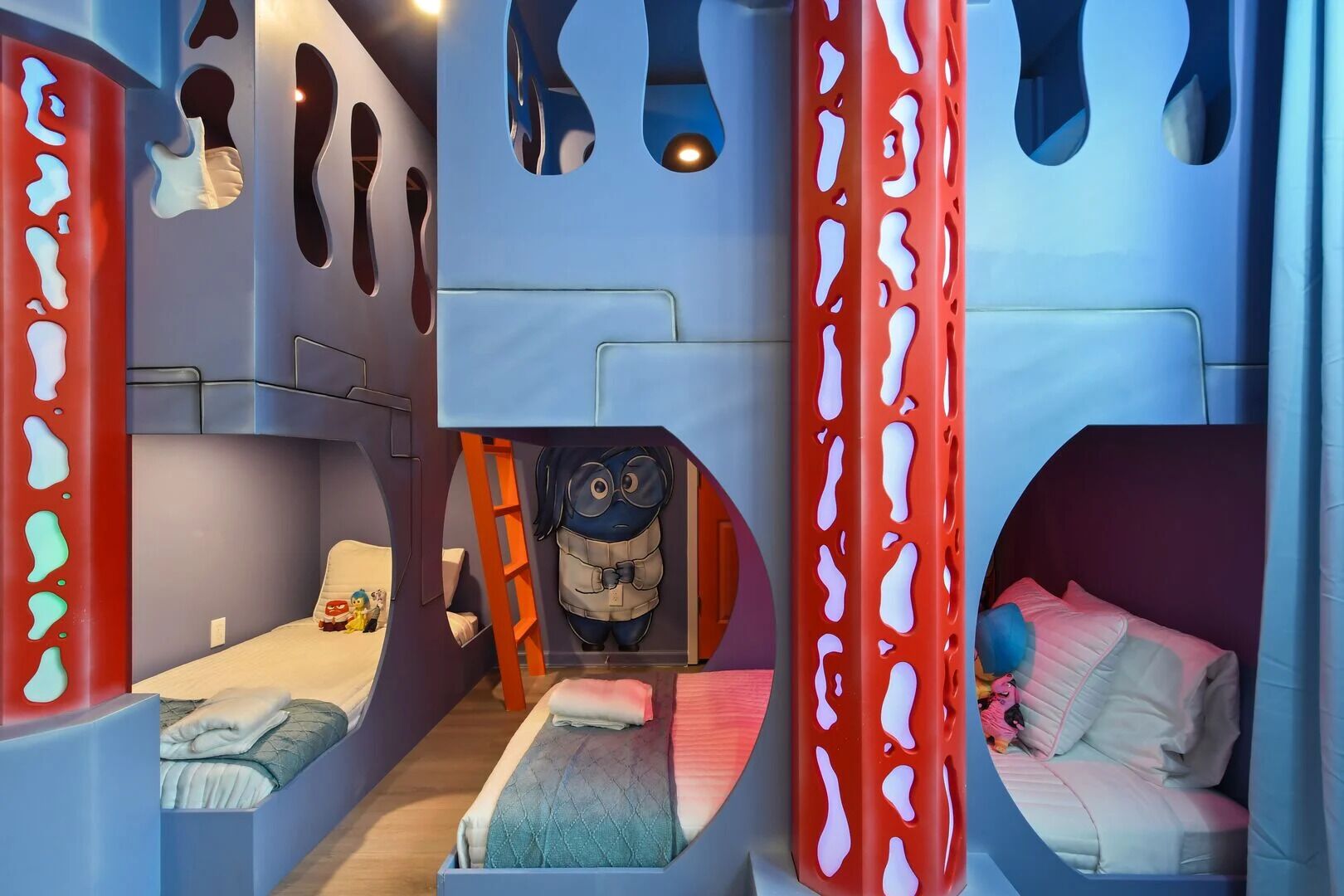 Step into a world of emotions: This Inside Out-themed kids’ room is a vibrant adventure of imagination and joy!