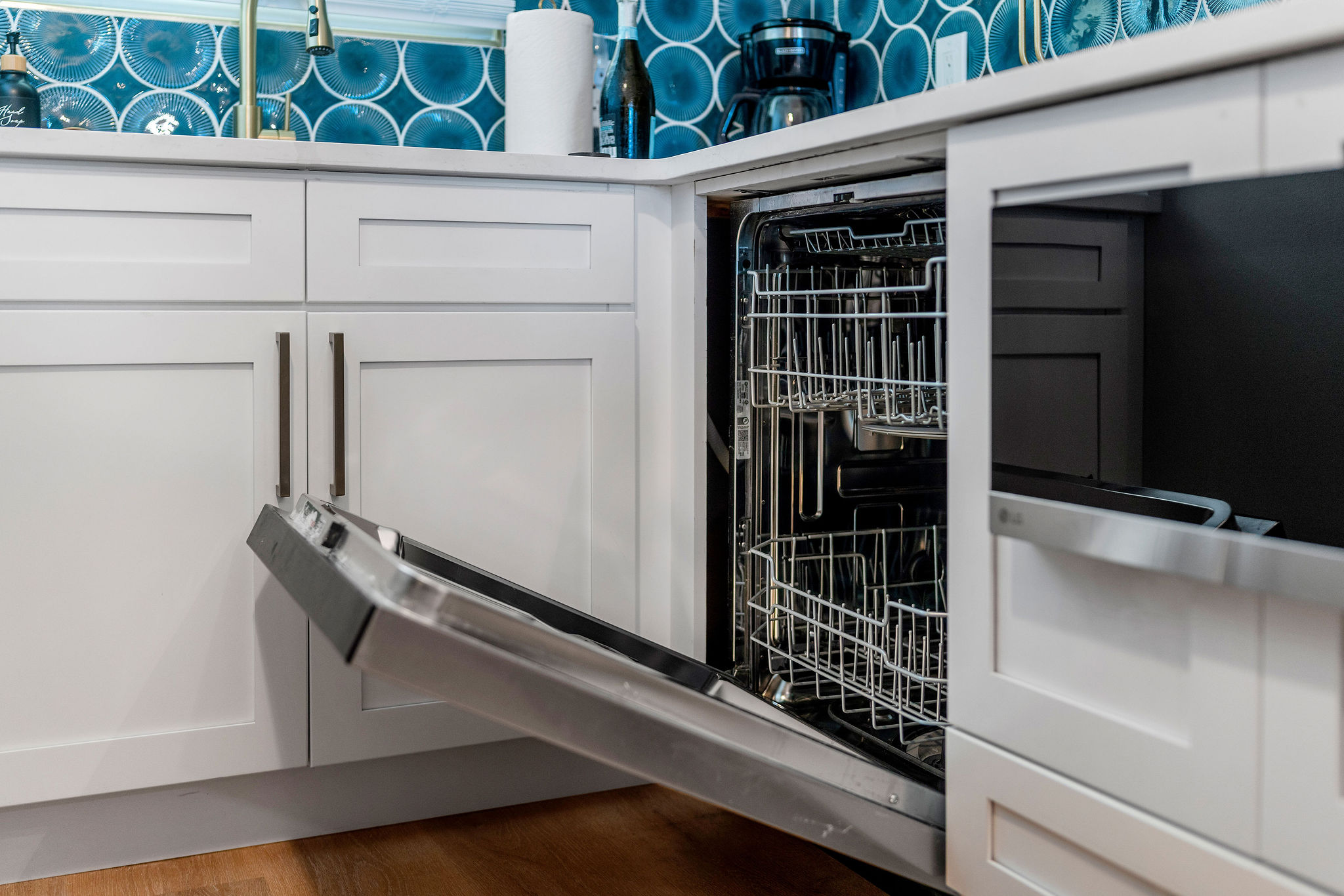 Brand new dishwasher and microwave make dishes easy. We supply hand and dish soap right by the deep brass sink, giving you one less thing to worry about packing.