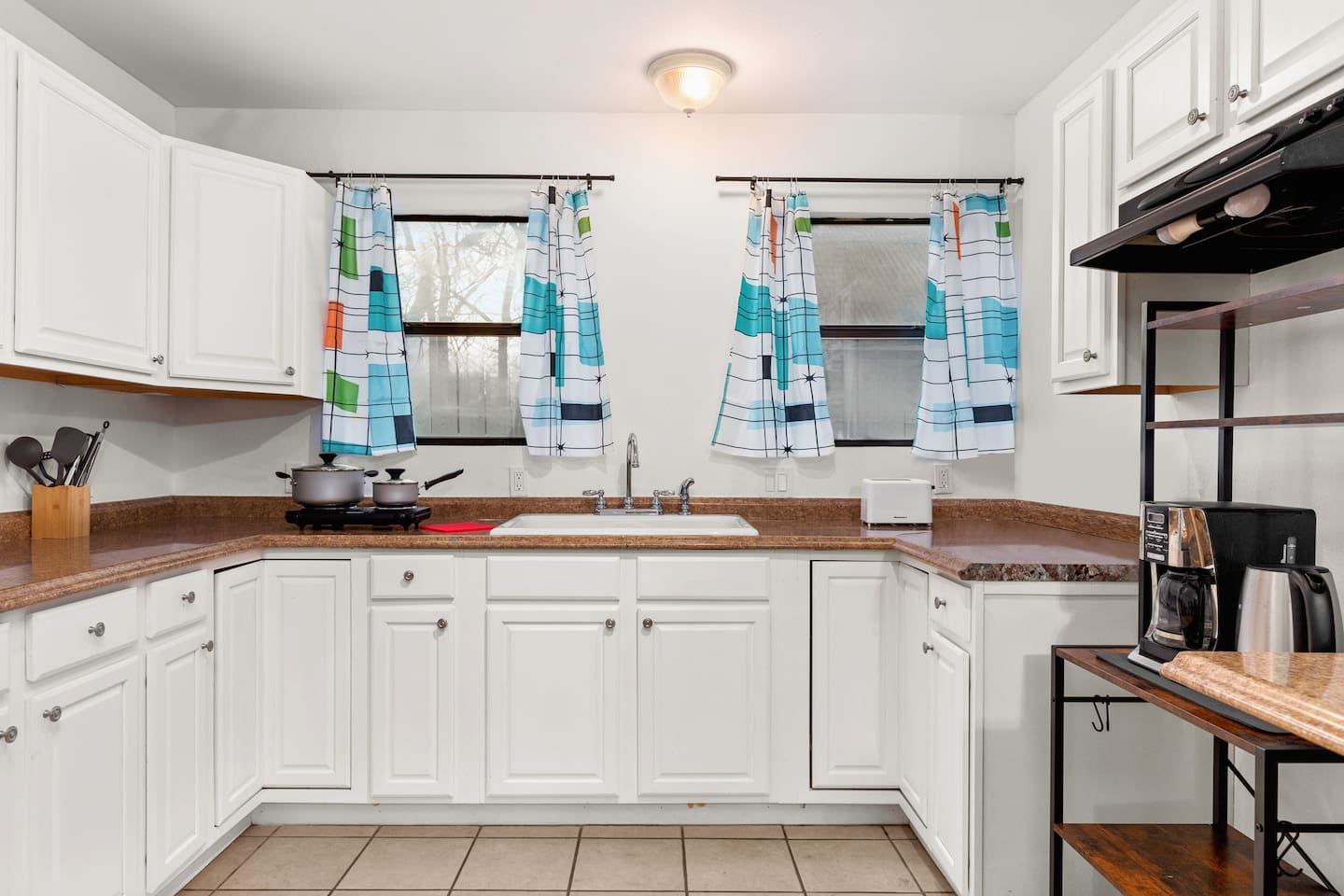 Whip up delicious meals in our casita kitchen, where functionality meets style for your home-cooked pleasures. The only thing missing is a stove and oven, however, we have a two-burner hotplate to use instead.