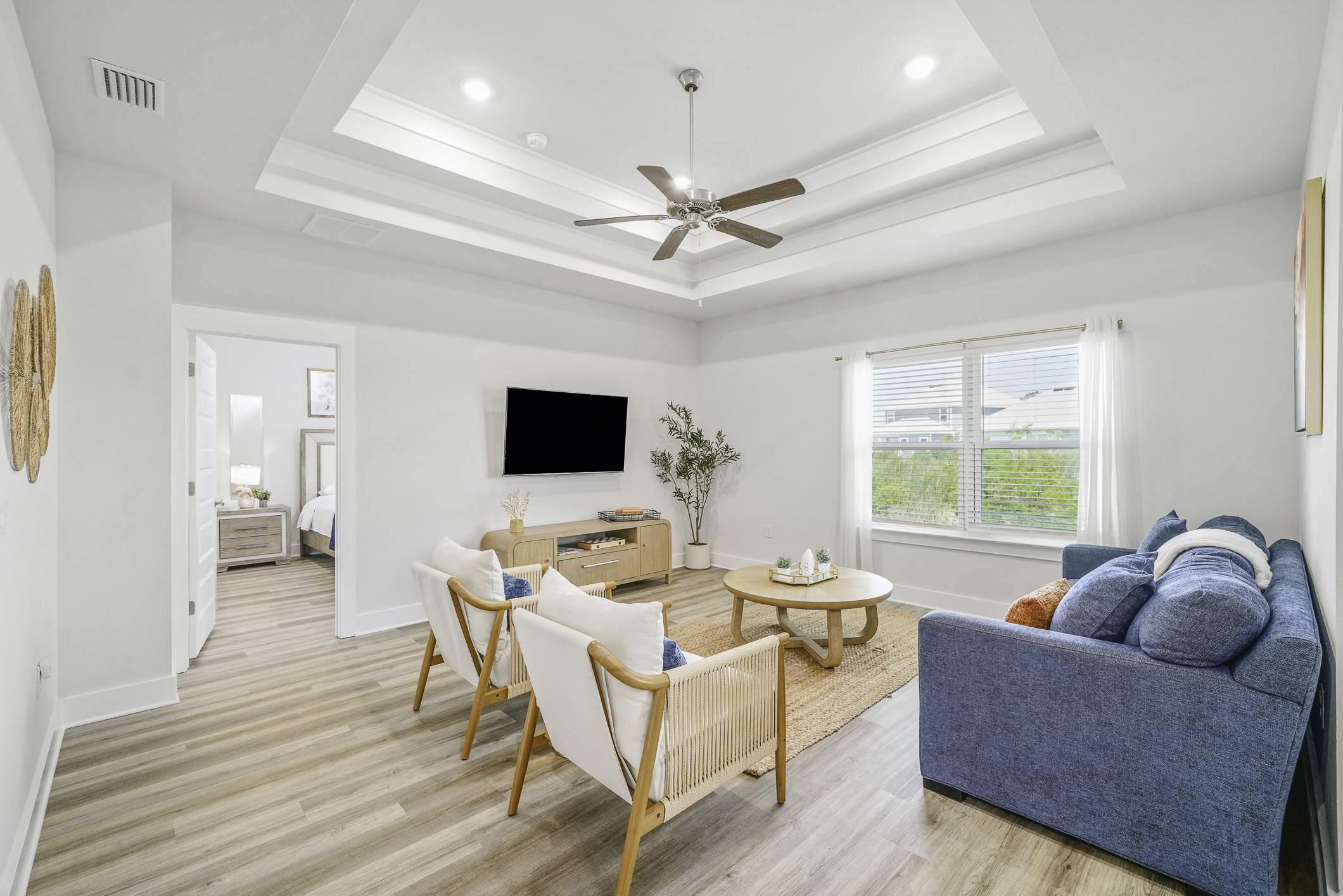 Gather, relax, and enjoy the bright and cozy living area during your stay
